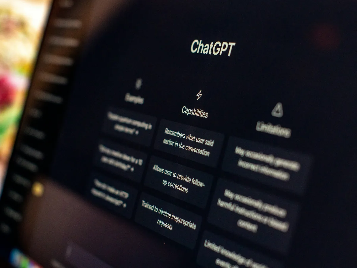 Close-up view of the ChatGPT interface on a dark computer screen showing capabilities and limitations